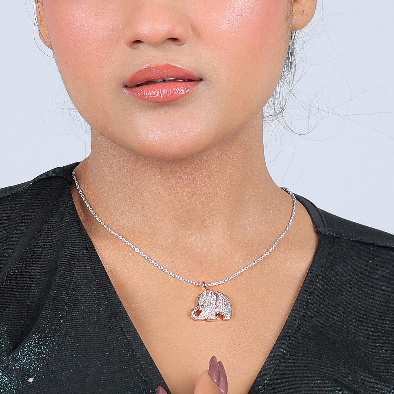 Shimmering Elegance: The Rose Gold Elephant Pendant