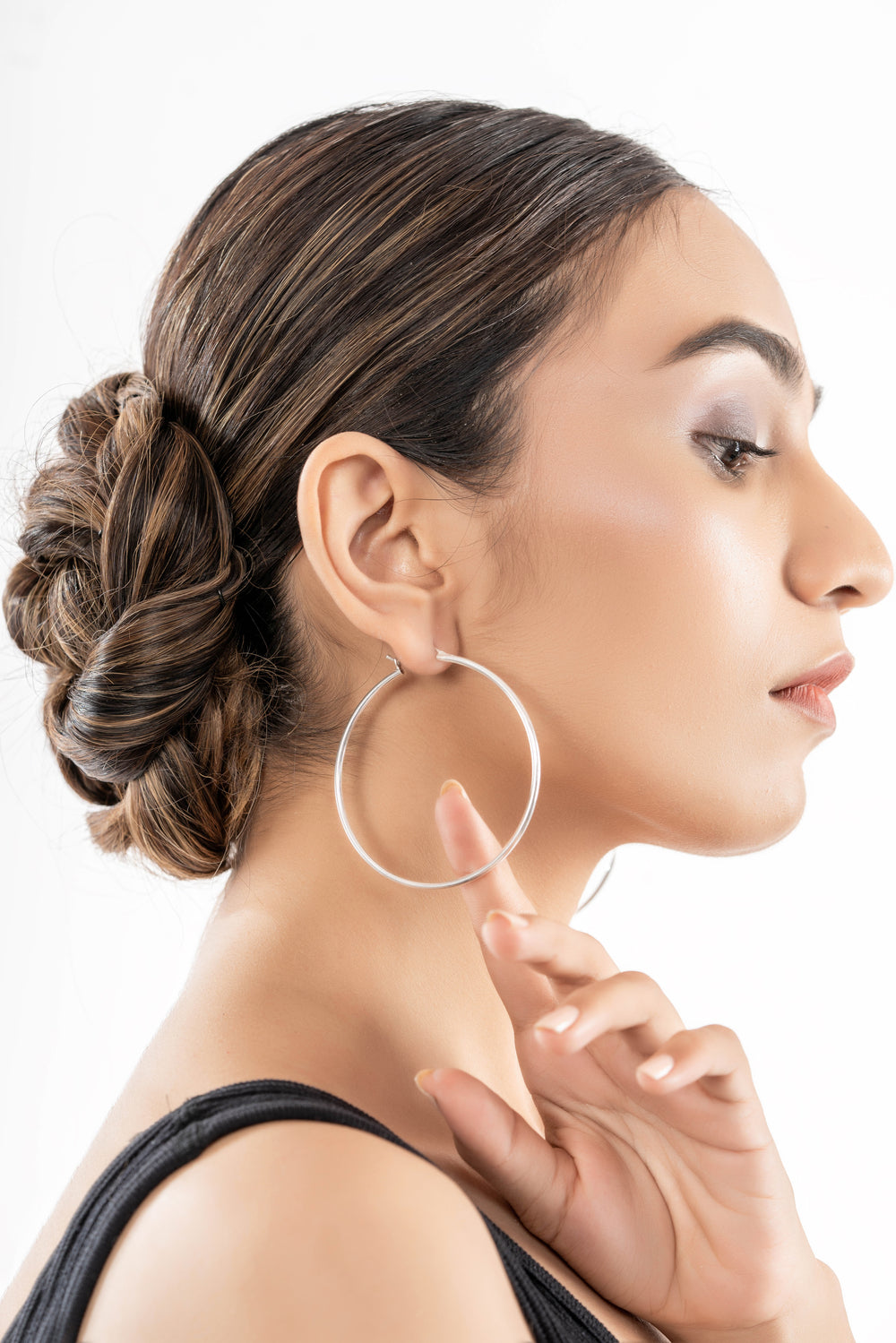 Whispering Elegance: Silver Hoops That Speak of Grace