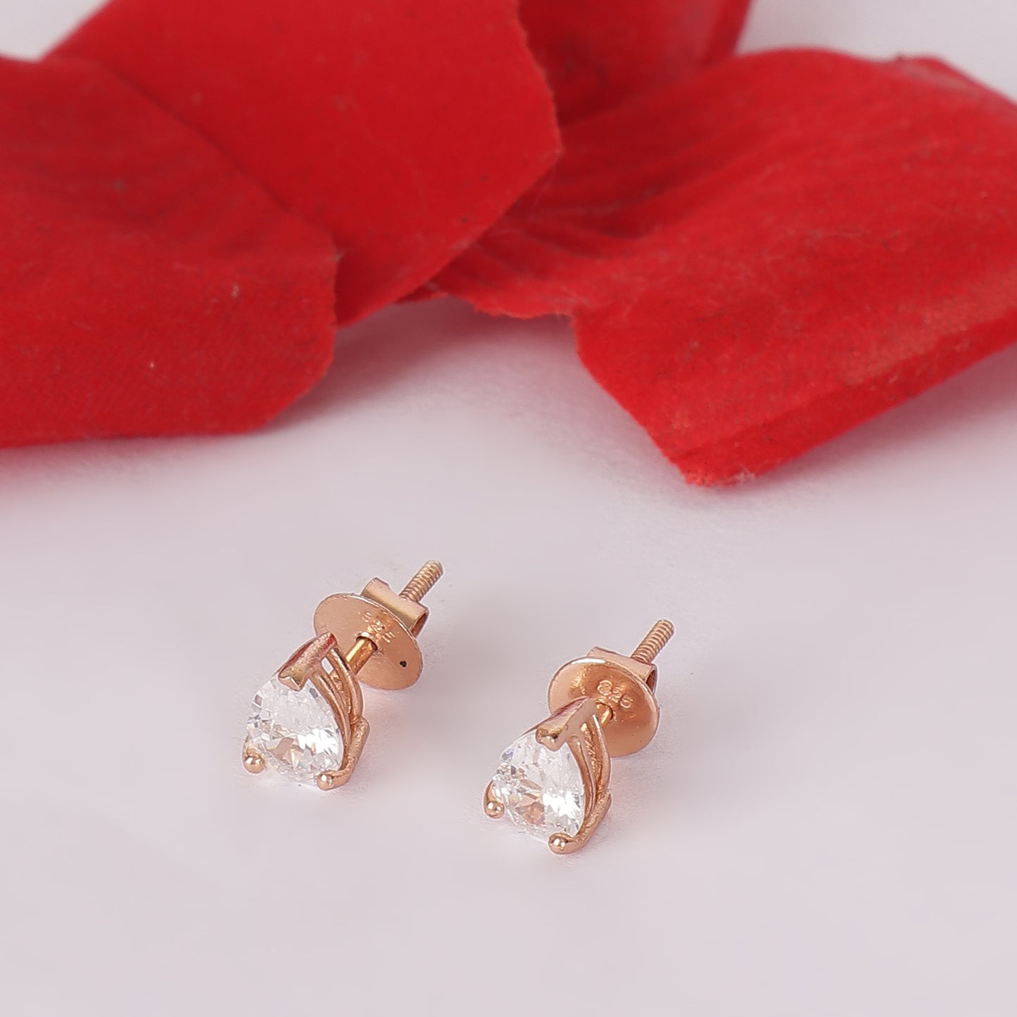 Trinity Brilliance: Rose Gold Triangle Crystal Studs