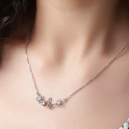 Delicate Charm: Rose Gold Vine Necklace with Gemstone Details