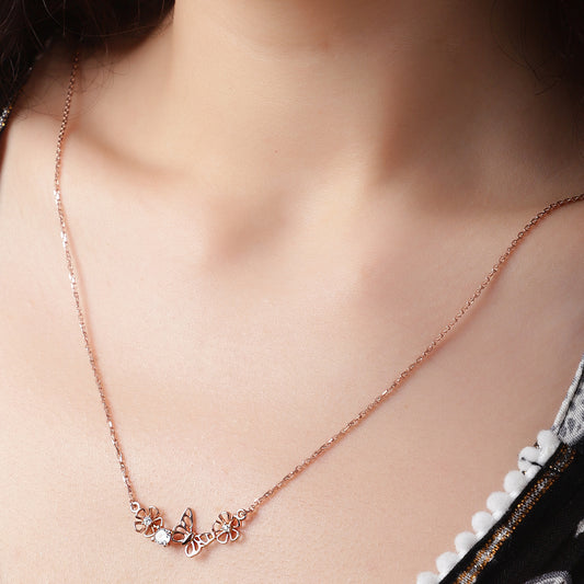 Blossom in Style: Rose Gold Floral Butterfly Necklace