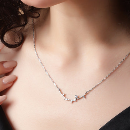 Grace in Every Detail: Elegant Silver Necklace with Crystal Accents