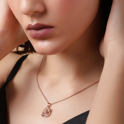 Graceful Embrace: Crystal-Trimmed Teardrop Pendant