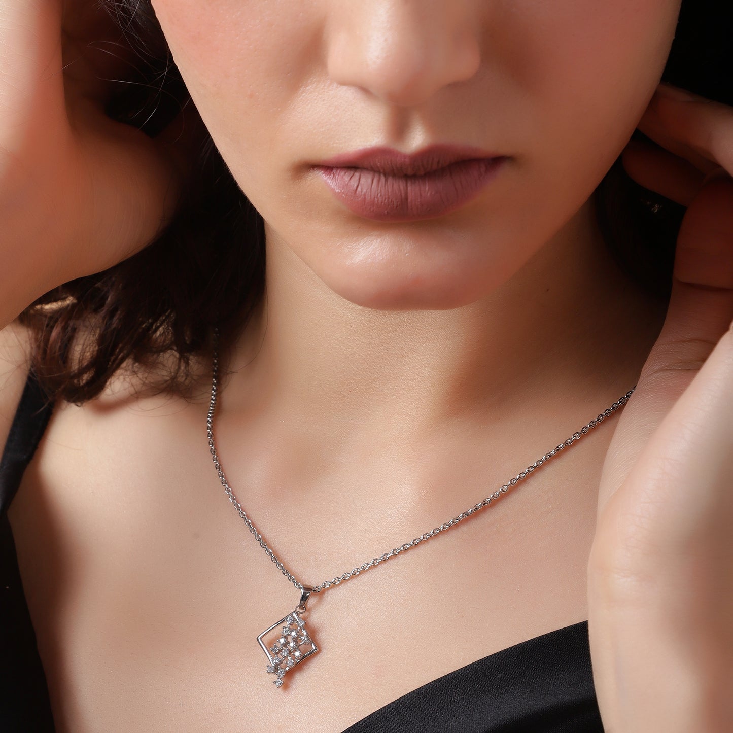 Geometric Brilliance: Crystal Rhombus Pendant