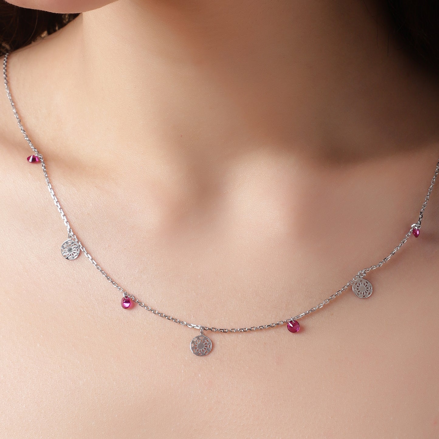 Dancing Medallions: Ruby & Silver Charm Station Necklace