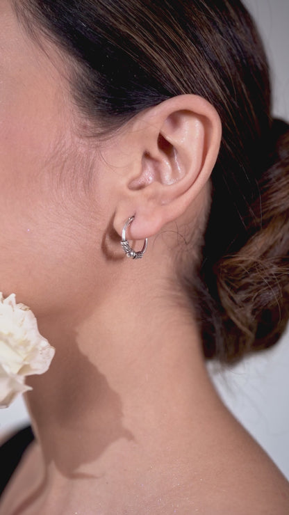 Graceful Tinkles: Ethereal Silver Small Hoop Earrings with a Soft Charm